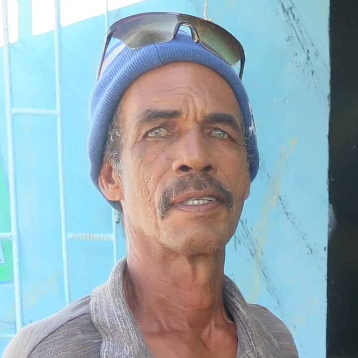 Calvin Silvia Straughn, in a blue knit cap