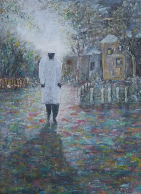 A painting of a figure in a white coat and hat walking down a lane of houses and fences, in small dabs of colour