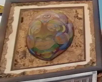 A framed calabash carving