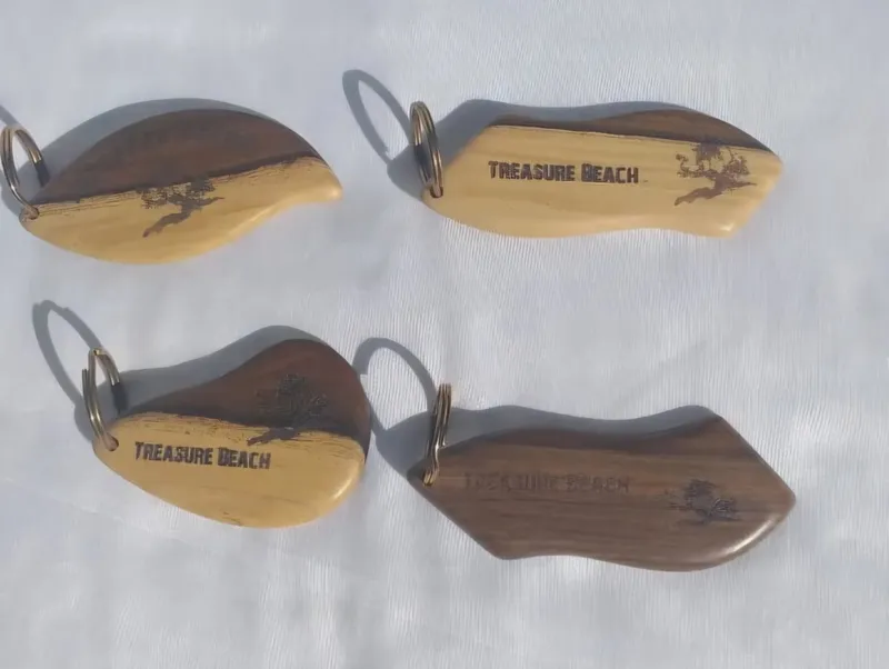 Wooden key rings in leaf and wave shapes, engraved Treasure Beach with a tree
